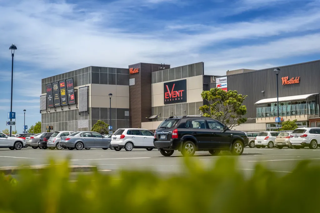Westfield Albany shopping centre with Event Cinemas and car park, highlighted by Real Estate Agent in Albany Michael Hossaini, Barfoot & Thompson.