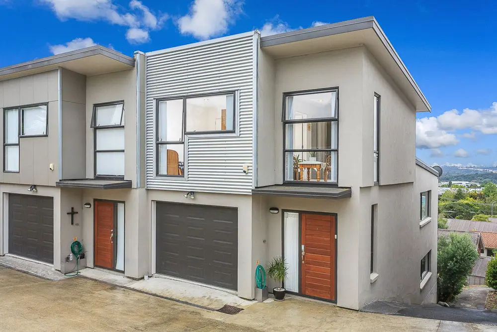 Contemporary townhouse with internal-access garage and elevated outlook in Schnapper Rock, presented by Real Estate Agent Schnapper Rock Michael Hossaini.