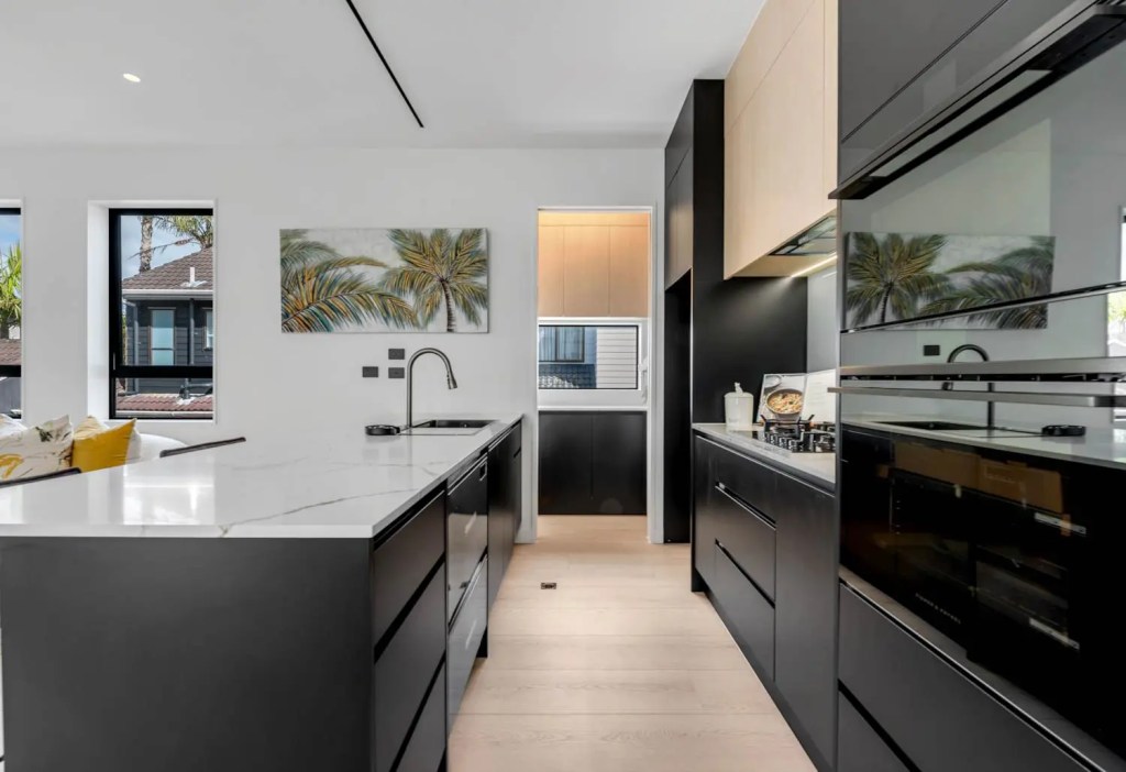 Contemporary Takapuna kitchen with modern finishes and open-plan design.